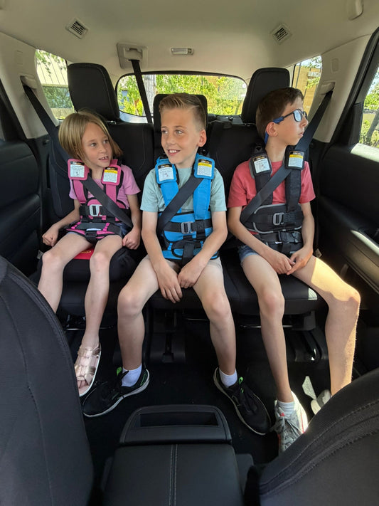 Is It Safe to Hold Your Child in a Car?